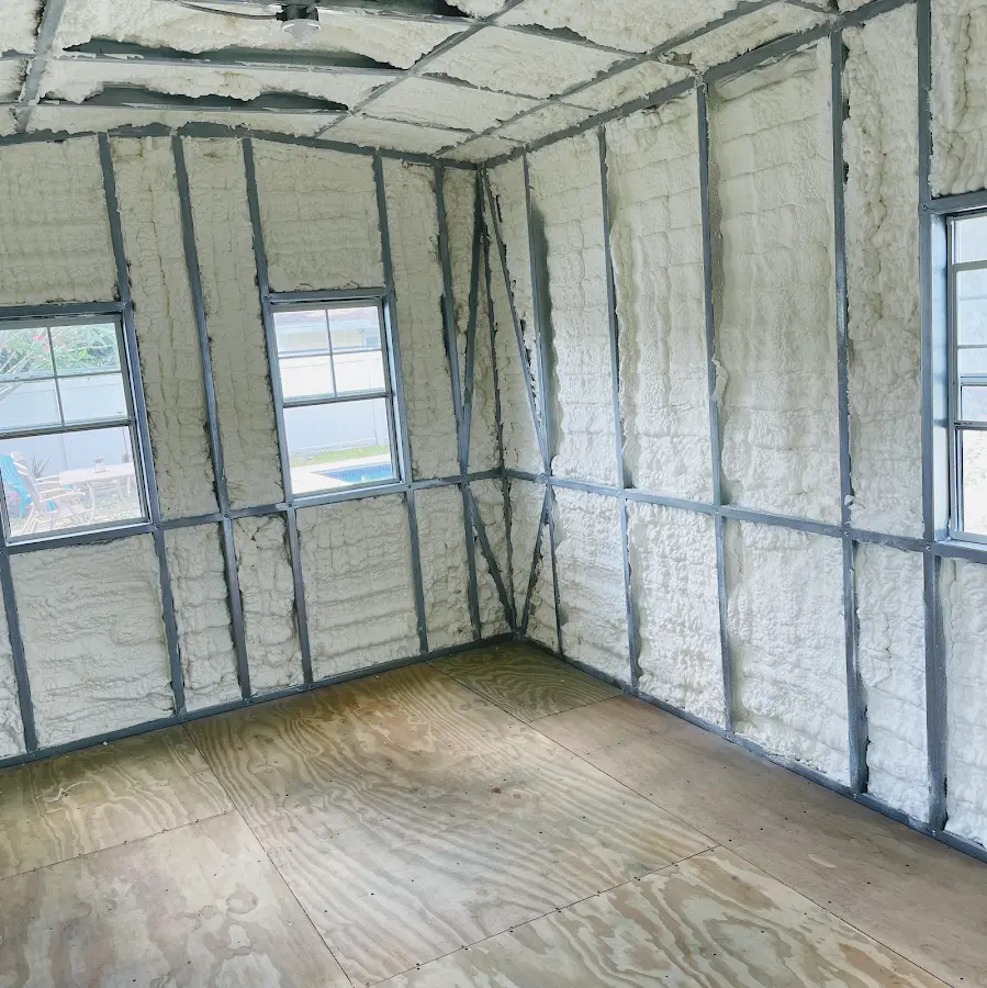 Closed-cell spray foam insulation applied to wall cavities in a residential project in Kalispell